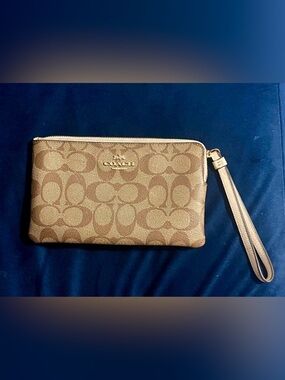 COACH Brown Signature Canvas Wristlet with Tan Strap